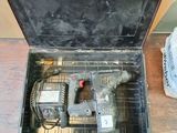an open tool box with tools inside of it on a table