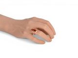 an image of a woman ' s hand with a ring on it ' s finger