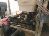 a picture of a rack of computer equipment in a room