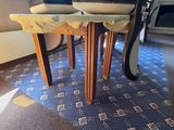a small table with two bowls on top of it