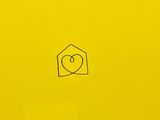 a yellow box with a heart drawn on it