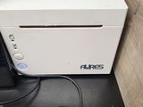 a white box with a printer and a mouse on top of it