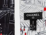 chanel tie in black and white with a red and black design