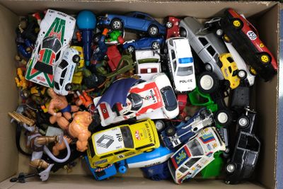 a box full of assorted toy cars in it