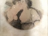 a picture of a picture of two women kissing each other