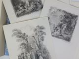 several cards with pictures of people in a wooded setting