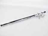 a close up of a pen on a white surface with a white background