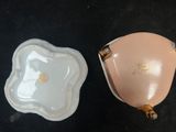 an image of a pink and white bowl and a white bowl