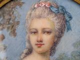 painting of a woman in a white dress with a blue bow on her head