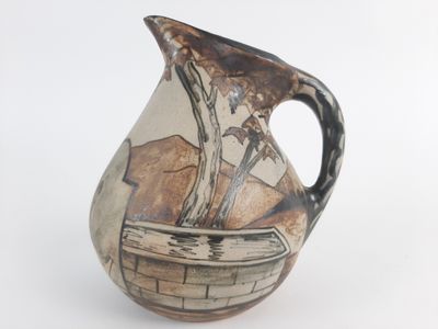 a vase that has a picture of a man in a boat on it