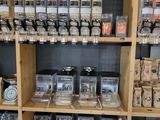 a wooden shelf filled with lots of different types of items