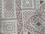 a close up of a piece of cloth with a design on it
