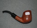 a pipe with a sticker on it sitting on the floor