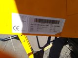 a label on the back of a yellow truck