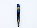an image of a pen laying on a white surface