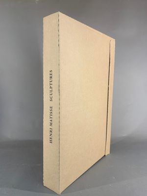 the book is open and sitting on a table