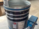 an image of a metal bucket with a blue handle on a table