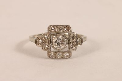 Bague en or gris 750 ‰ et platine sertie d'un diamant taille… - Photo 1