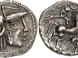 a silver coin with an image of a man riding a horse