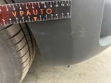 a close up of a sticker on a car ' s bumper