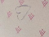 a close up of a piece of fabric with a design on it