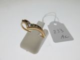 an image of a gold ring with diamonds on it next to a price tag