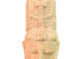 an image of a stone statue of a woman ' s head