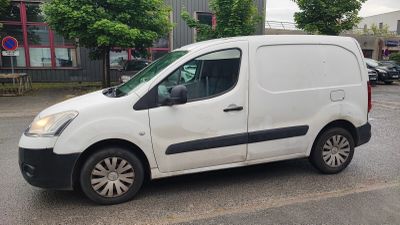 a white van parked on the side of the road