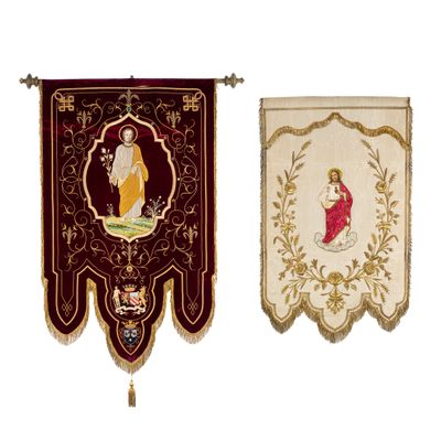 two banners with a picture of jesus and a woman hanging on a wall