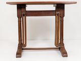 an image of a small table with a wooden top on a white background