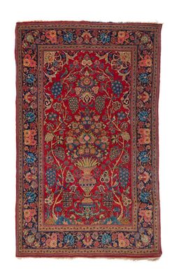 un tapis rouge avec un motif floral sur fond blanc