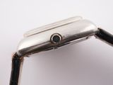 an image of a close up of a watch on a white surface