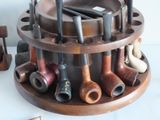 a lot of pipe holders that are on the table