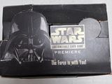 star wars darth vader helmet on display in a cardboard box