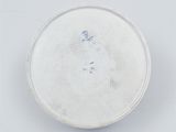 a white plate with a blue design on it