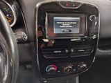 the dashboard of a car with a digital display in the center of it