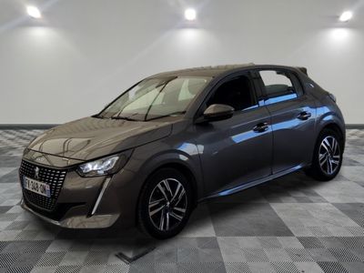 a grey car parked in a room with a checkered floor