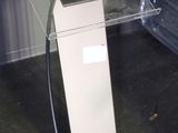 a clear table with a glass top in a room