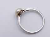 sterling silver ring with a pearl and a diamond