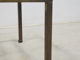 an image of a small wooden table with metal legs