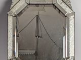 a mirror that is sitting on top of a table