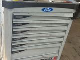 a cart with a bunch of tools on top of it
