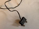 a black cord that is connected to a black plug