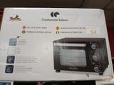 packaging of a black and white microwave sitting on display in a store