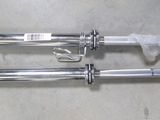 two forks that are sitting on a table