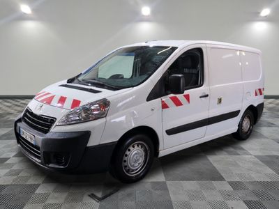 a picture of a white van parked in a garage