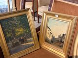 deux tableaux posés l'un à côté de l'autre sur une chaise