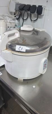 a crock pot sitting on top of a table in a kitchen