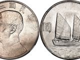 a close up of a coin with a boat on it