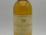 an image of a bottle of wine sitting on top of a table